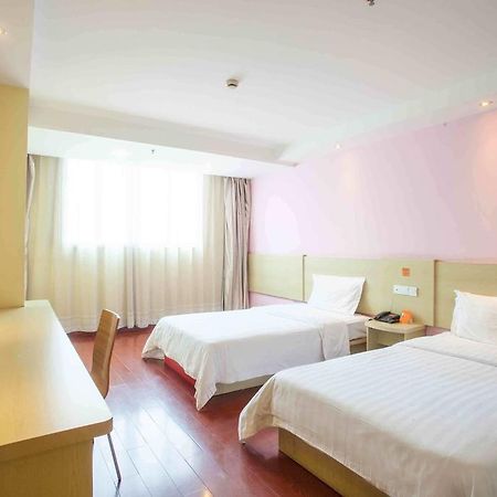 7Days Inn Guangzhou Gangding Longkou XI Road Гуанчжоу Номер фото