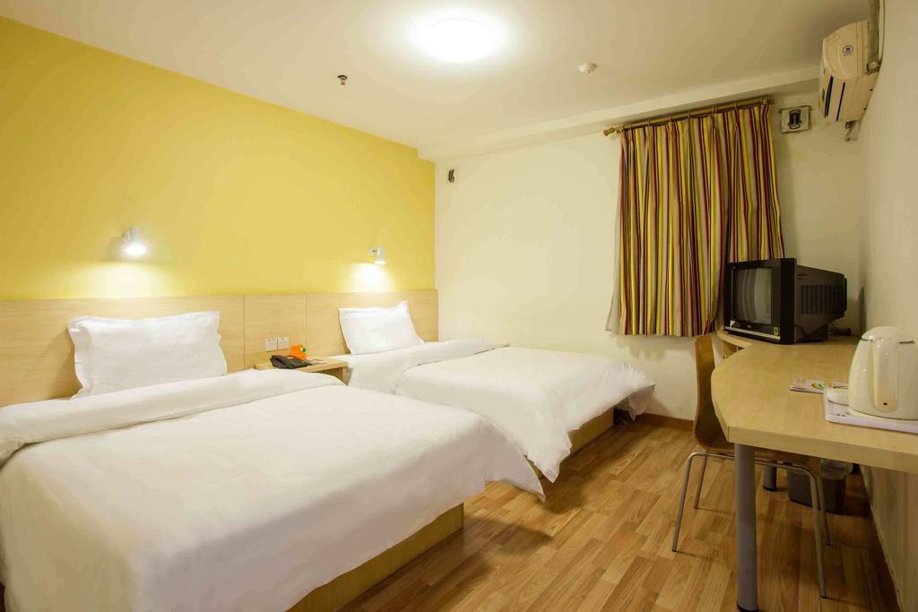 7Days Inn Guangzhou Gangding Longkou XI Road Гуанчжоу Номер фото