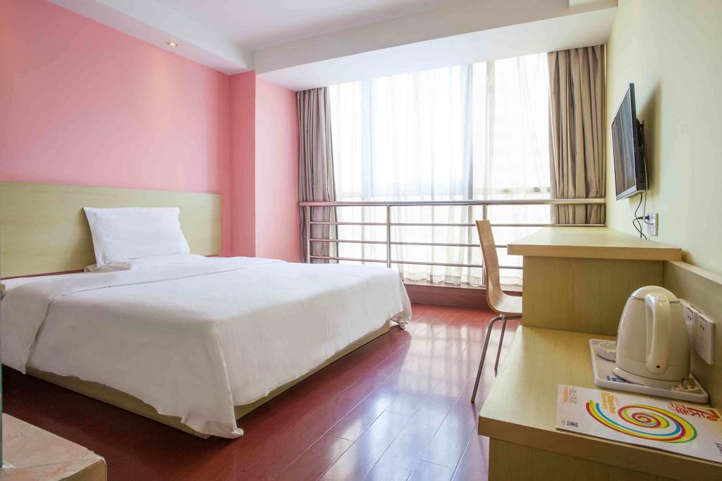 7Days Inn Guangzhou Gangding Longkou XI Road Гуанчжоу Номер фото
