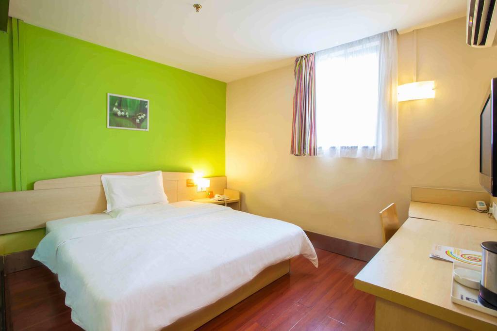 7Days Inn Guangzhou Gangding Longkou XI Road Гуанчжоу Номер фото