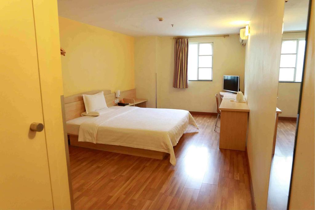 7Days Inn Guangzhou Gangding Longkou XI Road Гуанчжоу Номер фото