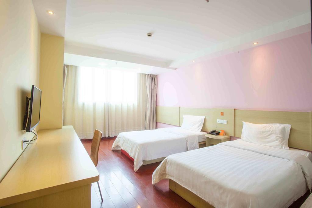 7Days Inn Guangzhou Gangding Longkou XI Road Гуанчжоу Номер фото